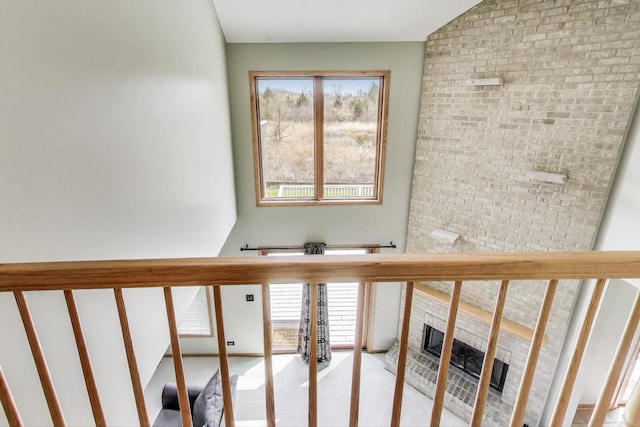23883 W Sarah Ct, Antioch, IL 60002 - stairway with healthy amount of natural light and a tiled fireplace