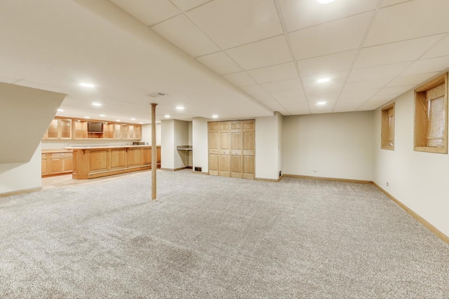 23883 W Sarah Ct, Antioch, IL 60002 - finished basement with baseboards, light colored carpet, a paneled ceiling, and recessed lighting