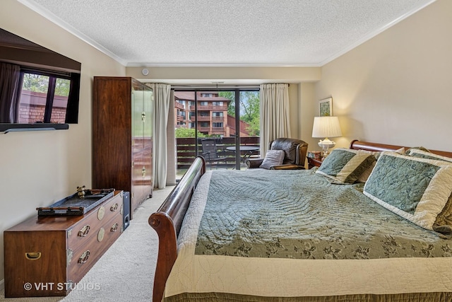 702 Waukegan Rd Unit A207, Glenview, IL 60025 - carpeted bedroom featuring access to exterior, a textured ceiling, and crown molding