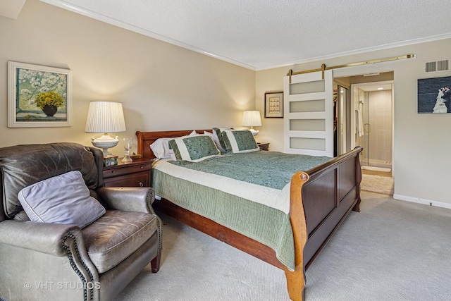 702 Waukegan Rd Unit A207, Glenview, IL 60025 - carpeted bedroom featuring ornamental molding, baseboards, a textured ceiling, and ensuite bathroom
