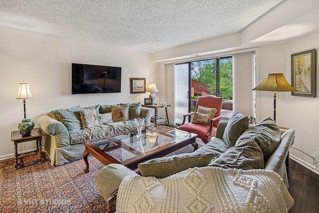 702 Waukegan Rd Unit A207, Glenview, IL 60025 - living area featuring a textured ceiling and baseboards