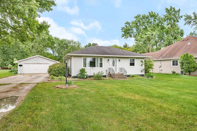 341 N Center St, Braidwood, IL 60408 - view of front of house with an outdoor structure, a garage, and a front lawn