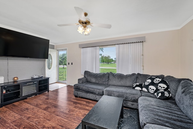 341 N Center St, Braidwood, IL 60408 - living area with ornamental molding, wood finished floors, and a ceiling fan