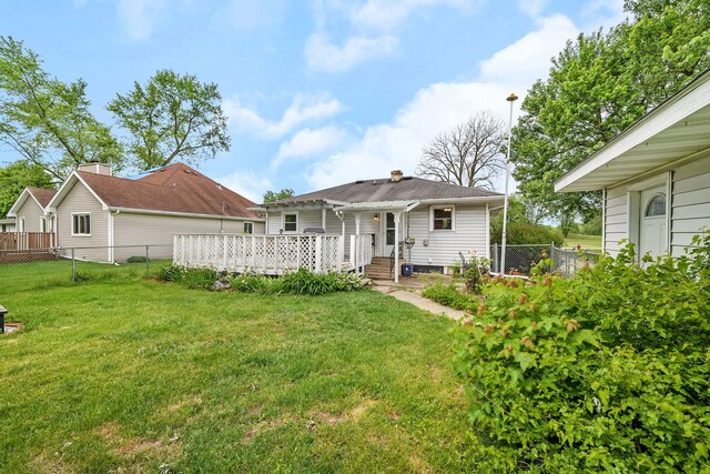 341 N Center St, Braidwood, IL 60408 - back of house featuring a deck