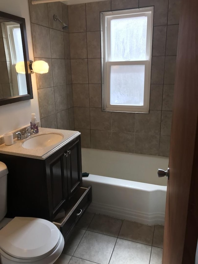 802 Bellwood Ave Unit 2S, Bellwood, IL 60104 - bathroom featuring toilet, tile patterned floors, vanity, and shower / tub combination