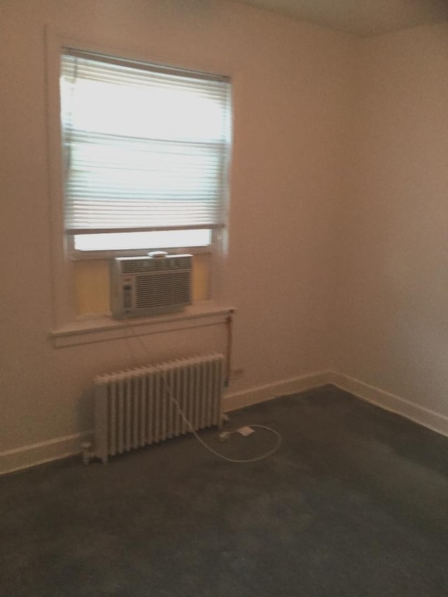 802 Bellwood Ave Unit 2S, Bellwood, IL 60104 - unfurnished room with radiator, baseboards, and cooling unit