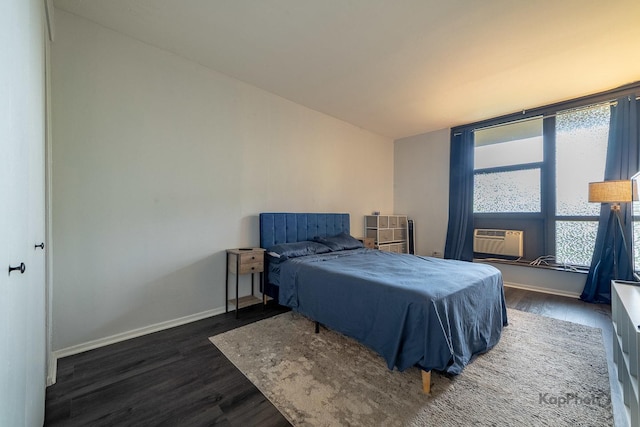 3021 S Michigan Ave Unit 102, Chicago, IL 60616 - bedroom with wood finished floors, baseboards, and an AC wall unit