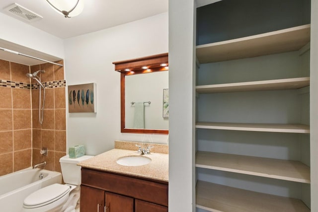 493 Mchenry Rd Unit 1B, Wheeling, IL 60090 - bathroom featuring vanity, tub / shower combination, and toilet