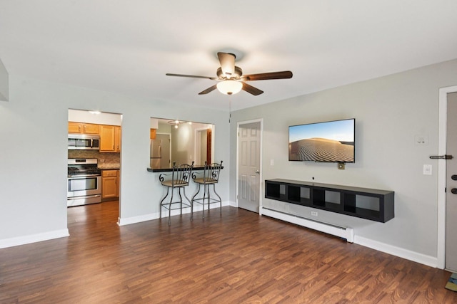 493 Mchenry Rd Unit 1B, Wheeling, IL 60090 - unfurnished living room with ceiling fan, dark wood-style flooring, baseboards, and a baseboard heating unit