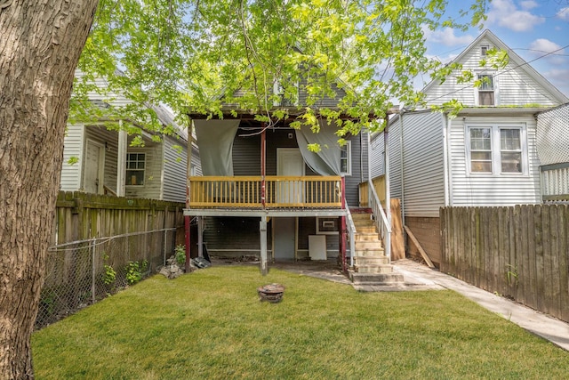 907 W 50th St, Chicago, IL 60609 - rear view of house with stairway and a deck