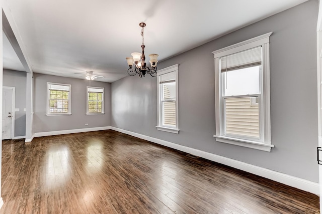 907 W 50th St, Chicago, IL 60609 - empty room with a chandelier, baseboards, dark wood-style floors, and a ceiling fan