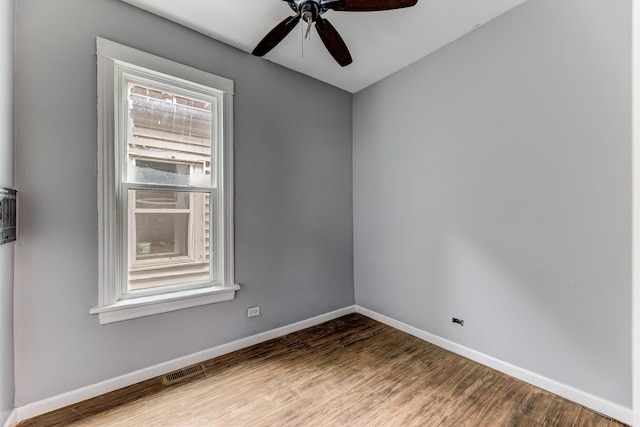 907 W 50th St, Chicago, IL 60609 - unfurnished room featuring ceiling fan, baseboards, and wood finished floors