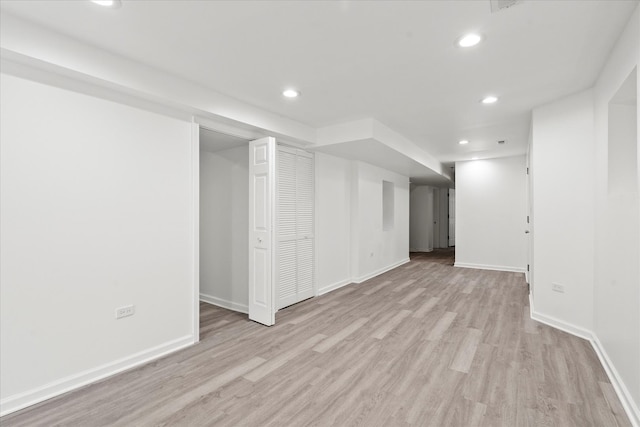 4336 W Gladys Ave, Chicago, IL 60624 - finished below grade area with light wood-type flooring, baseboards, and recessed lighting