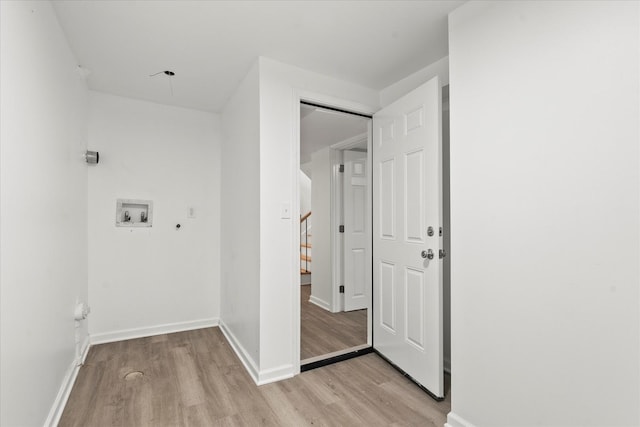 4336 W Gladys Ave, Chicago, IL 60624 - laundry area featuring washer hookup, light wood finished floors, and baseboards