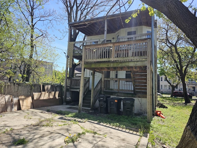 4336 W Gladys Ave, Chicago, IL 60624 - back of house featuring stairway and a balcony