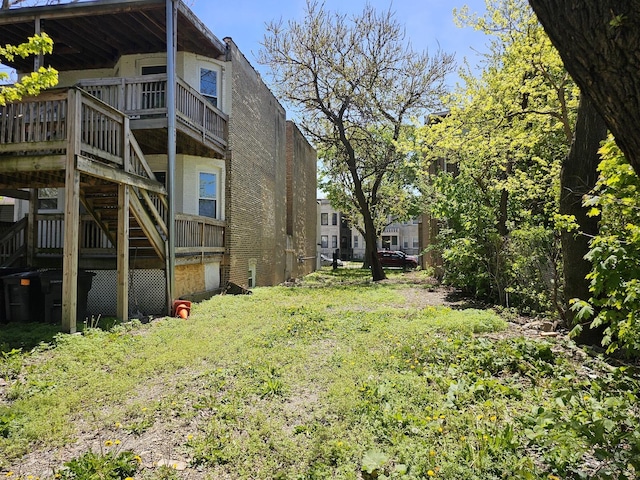 4336 W Gladys Ave, Chicago, IL 60624 - view of yard featuring a wooden deck and stairway