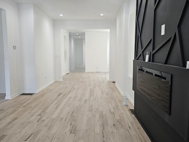 4336 W Gladys Ave, Chicago, IL 60624 - hall featuring light wood finished floors, baseboards, and recessed lighting