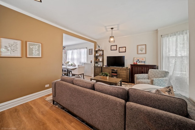 4619 N Springfield Ave, Chicago, IL 60625 - living area with wood finished floors, ornamental molding, and baseboards