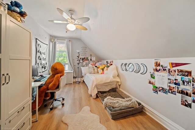 4619 N Springfield Ave, Chicago, IL 60625 - bedroom with light wood-style flooring, a desk, lofted ceiling, a ceiling fan, and baseboards