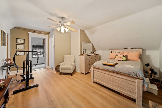 4619 N Springfield Ave, Chicago, IL 60625 - bedroom with light wood-style flooring, vaulted ceiling, baseboards, and a ceiling fan