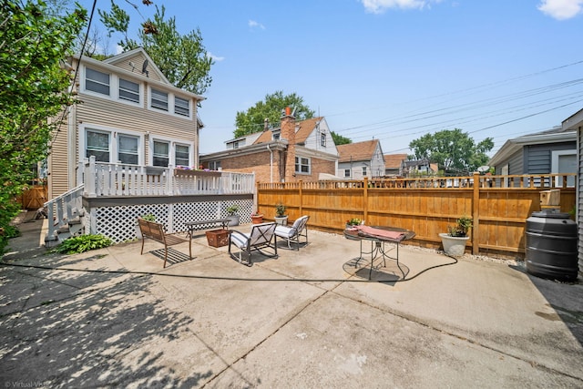 4619 N Springfield Ave, Chicago, IL 60625 - view of patio with a wooden deck and an outdoor fire pit