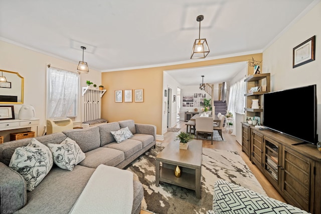 4619 N Springfield Ave, Chicago, IL 60625 - living area with plenty of natural light, light wood-style floors, and crown molding