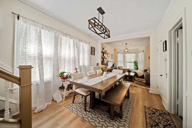4619 N Springfield Ave, Chicago, IL 60625 - dining room featuring wood finished floors and crown molding