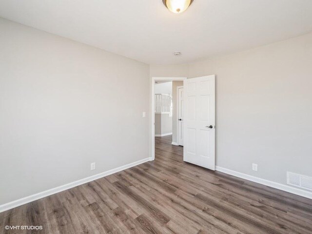 35491 N Kenneth Dr, Lake Villa, IL 60046 - unfurnished room with wood finished floors and baseboards