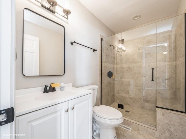 35491 N Kenneth Dr, Lake Villa, IL 60046 - full bath featuring a shower stall, vanity, toilet, and tile patterned flooring