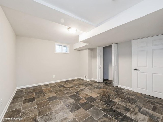 35491 N Kenneth Dr, Lake Villa, IL 60046 - basement featuring dark stone finish flooring and baseboards
