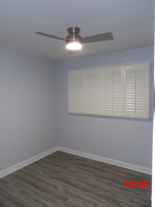 14715 Kenwood Ave, Dolton, IL 60419 - unfurnished room featuring ceiling fan, dark wood-type flooring, and baseboards