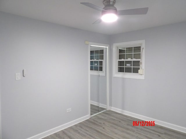 14715 Kenwood Ave, Dolton, IL 60419 - empty room with ceiling fan, wood finished floors, and baseboards
