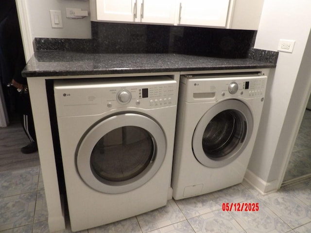 14715 Kenwood Ave, Dolton, IL 60419 - washroom featuring washing machine and clothes dryer, cabinet space, and baseboards