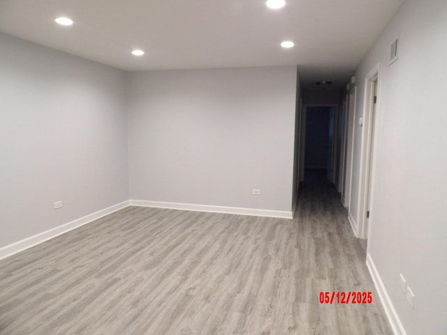 14715 Kenwood Ave, Dolton, IL 60419 - spare room with wood finished floors, recessed lighting, and baseboards