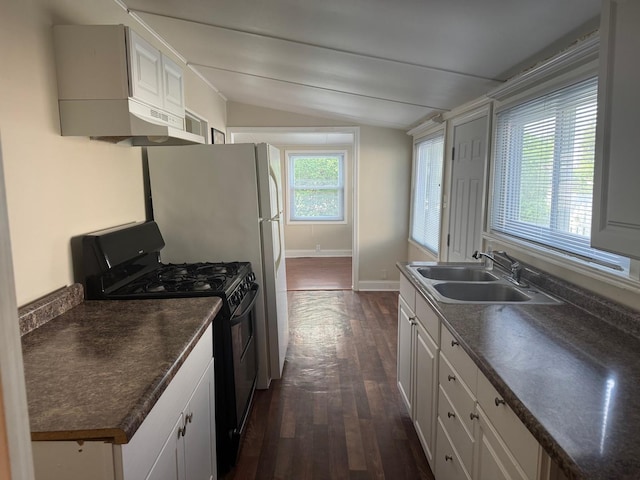 24521 W Stub Ave, Round Lake, IL 60073 - kitchen with gas stove, dark countertops, a sink, lofted ceiling, and dark wood-style floors