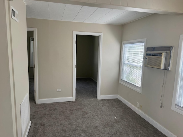 24521 W Stub Ave, Round Lake, IL 60073 - carpeted spare room featuring a wall mounted air conditioner and baseboards