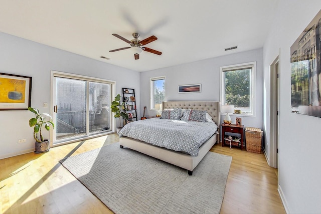 1133 N Wood St Unit 3S, Chicago, IL 60622 - bedroom featuring access to outside, wood finished floors, ceiling fan, and baseboards