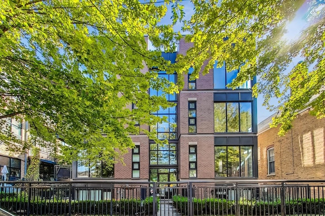 1133 N Wood St Unit 3S, Chicago, IL 60622 - rear view of house with brick siding