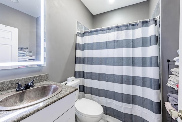 2814 W 40th St, Chicago, IL 60632 - bathroom featuring toilet, vanity, and a shower with shower curtain