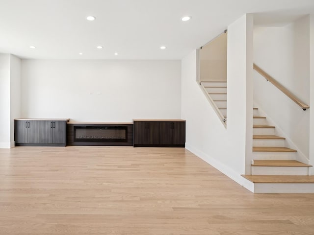 965 E 62nd St Unit 1, Chicago, IL 60637 - unfurnished room featuring stairs, recessed lighting, light wood-style floors, and baseboards