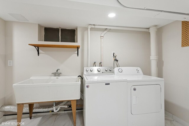 6502 Palma Ln, Morton Grove, IL 60053 - laundry room featuring washing machine and dryer, light marble finish flooring, recessed lighting, and baseboards