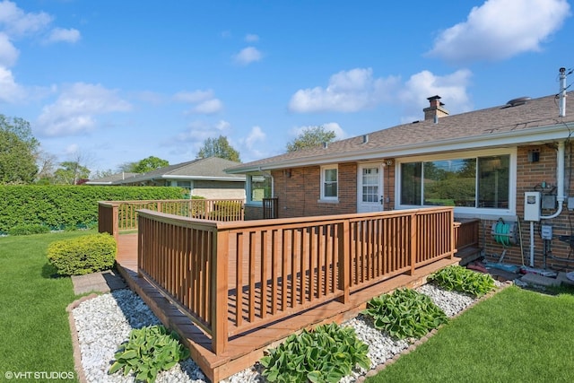 6502 Palma Ln, Morton Grove, IL 60053 - wooden deck featuring a lawn