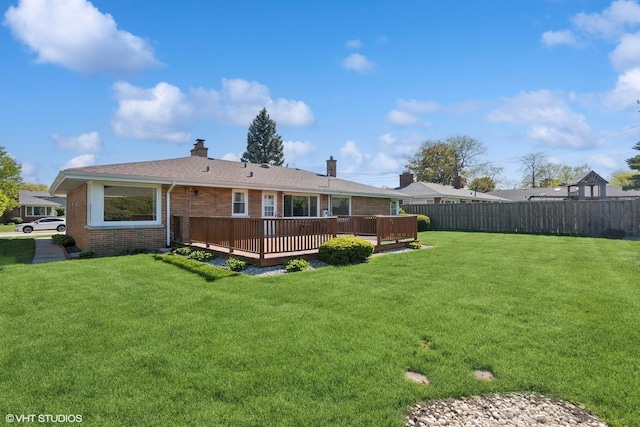 6502 Palma Ln, Morton Grove, IL 60053 - rear view of house with brick siding, a deck, and a chimney