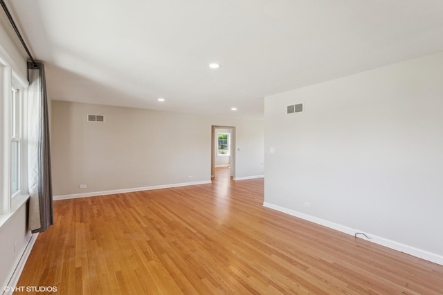 6502 Palma Ln, Morton Grove, IL 60053 - spare room with light wood-style floors, recessed lighting, and baseboards