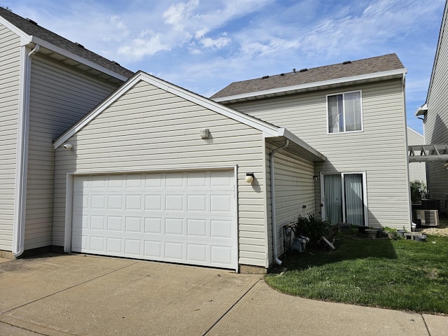 372 Windsong Ct Unit 0, Bolingbrook, IL 60440 - view of front of house featuring driveway, a garage, and central air condition unit