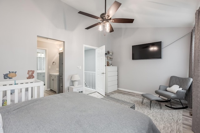 1357 Coldspring Rd, Carol Stream, IL 60188 - bedroom with light wood-type flooring, baseboards, high vaulted ceiling, ensuite bathroom, and ceiling fan