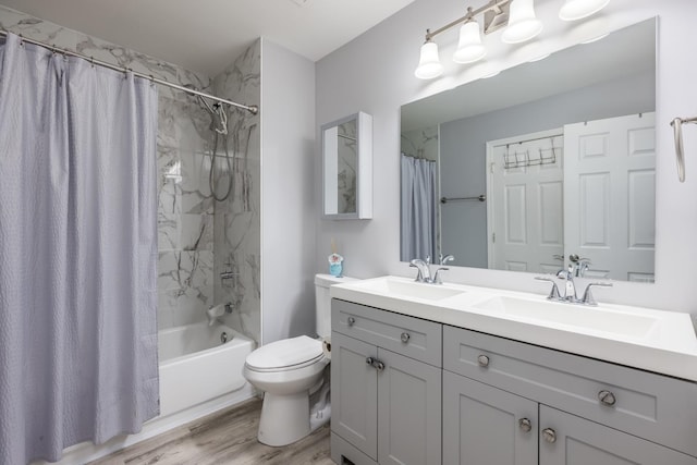 1357 Coldspring Rd, Carol Stream, IL 60188 - bathroom featuring shower / bathtub combination with curtain, double vanity, wood finished floors, and toilet