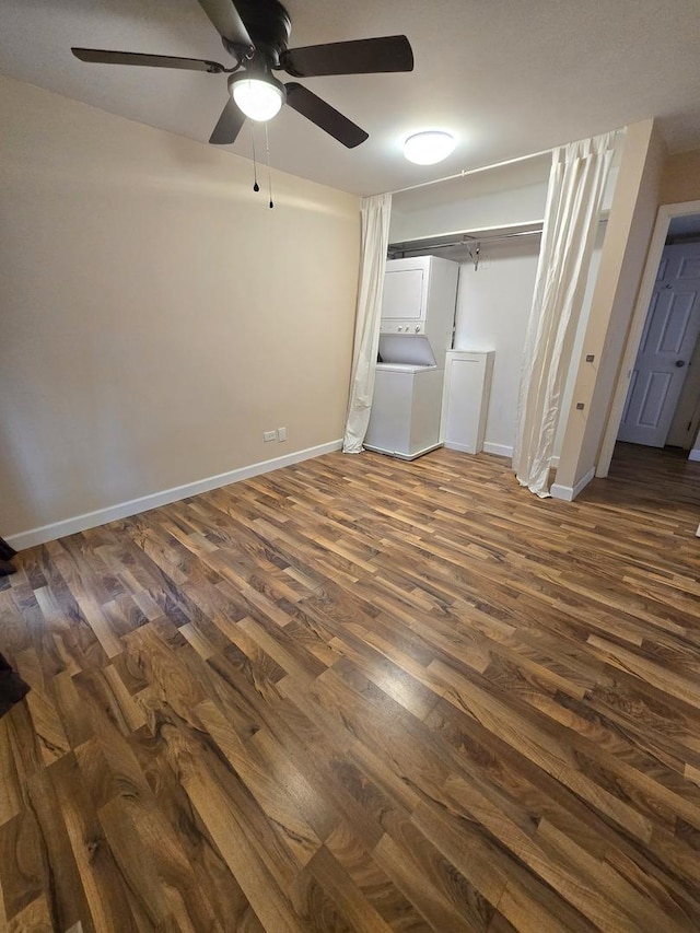5538 E Lake Dr Unit A, Lisle, IL 60532 - unfurnished bedroom featuring dark wood-type flooring, baseboards, and ceiling fan