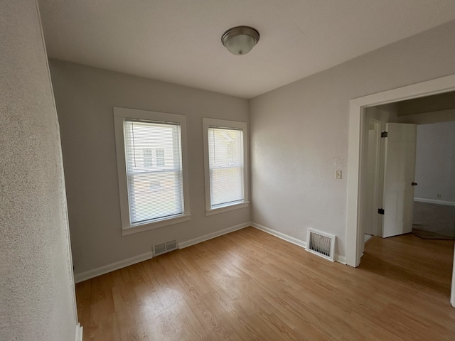 650 Enterprise St, Elgin, IL 60120 - spare room with light wood-style floors and baseboards