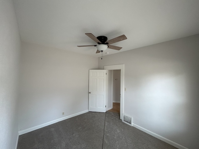 650 Enterprise St, Elgin, IL 60120 - unfurnished room with ceiling fan, baseboards, and dark colored carpet